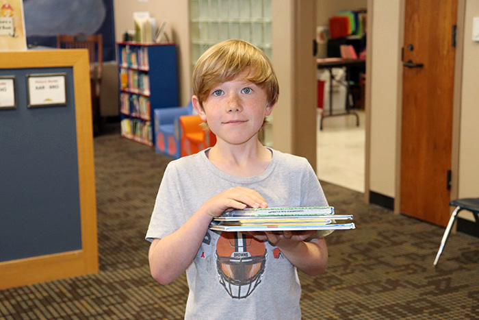 Boy with books